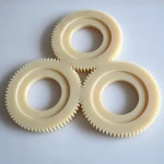 Nylon products are with good toughness, strong abrasion resistance, oil resistance, shock resistance, tensile and bending strength, low water absorption and good dimensional stability. daher, they are use to process various wear-resistant high-strength parts. This product is a good material to replace steel, Eisen, copper and other metals with plastic, is an important engineering plastics. Cast nylon is widely used to replace the wear-resistant parts of machinery and equipment, and to replace copper and alloy as the wear-resistant parts of equipment. Applicable to the production of wear-resistant parts, transmission structure parts, household appliances parts, automobile manufacturing parts, screw to prevent mechanical parts, chemical machinery parts, chemical equipment. Such as turbines, gears, bearings, impellers, cranks, instrument panels, drive shafts, Ventile, blades, silk rods, high-pressure washers, screws, nuts, seals, shuttles, sets of simple, bushings connectors.